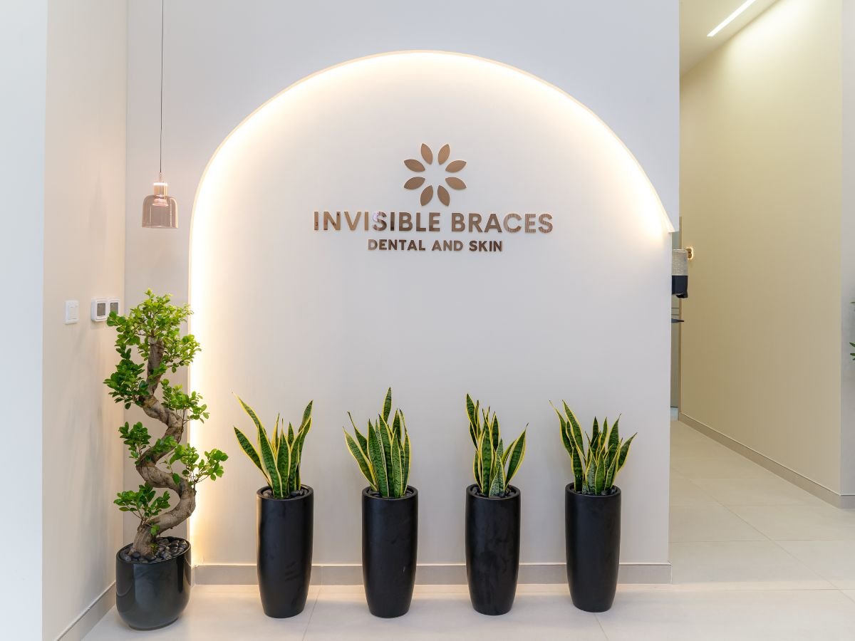 Logo wall and reception area at Invisible Braces Dental and Skin Polyclinic, Dubai